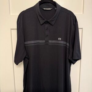 Travis Mathew Black Polo with Gray Chest Stripe